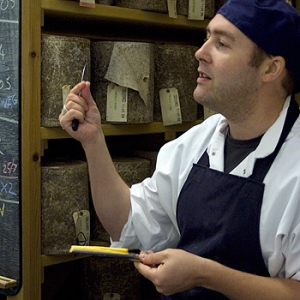 Chris George, like me, also ex of Neal's Yard Dairy, sampling cheese on a tour of their maturing facility, back in 2009